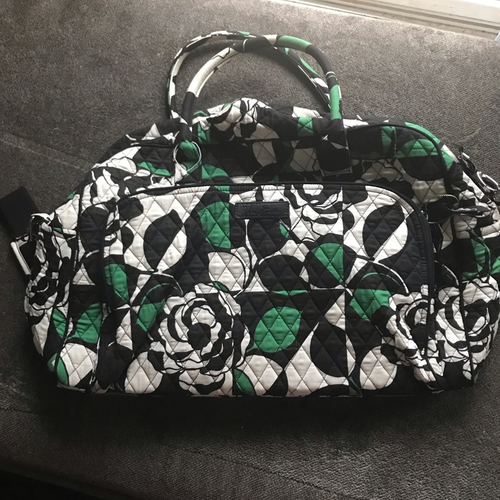 Black, white and green Vera Bradley quilter duffle used once. Great condition
